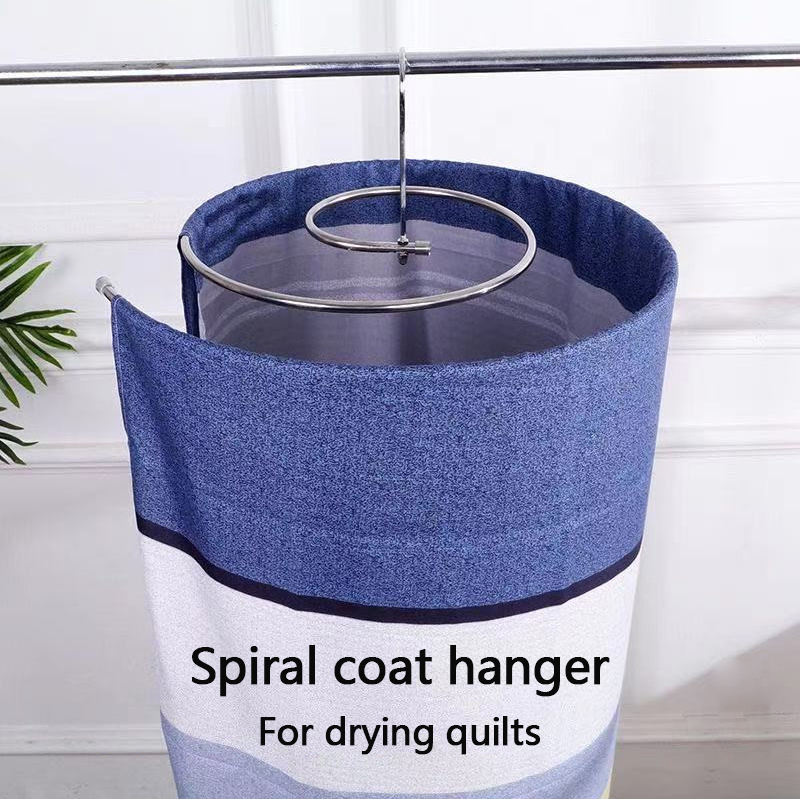 Stainless steel spiral clothes drying rack, large round rotating for home use, for drying quilts, sheets, and duvet covers.