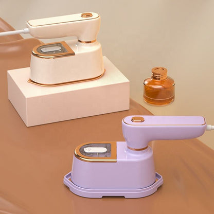 New portable handheld garment steamer for home use, foldable design.